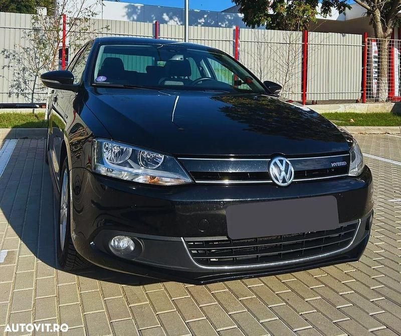 Culoarenegru Utilizat 2013 VW Jetta Hybrid Comfortline Berlinǎ | 7.800 EUR - Imagine 1/4