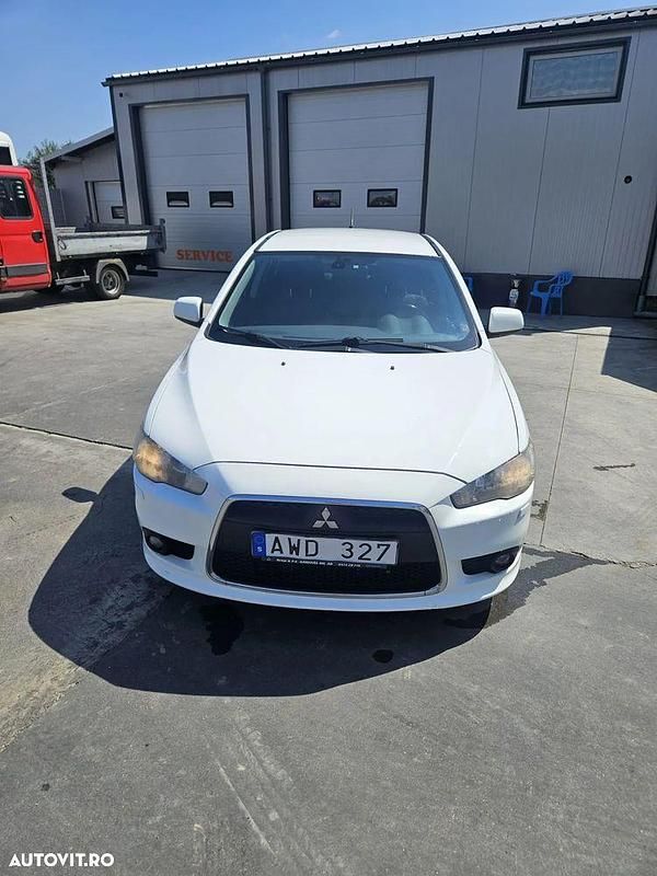 Culoarealb Utilizat 2011 Mitsubishi Lancer Hatchback | 2.600 EUR - Imagine 1/4