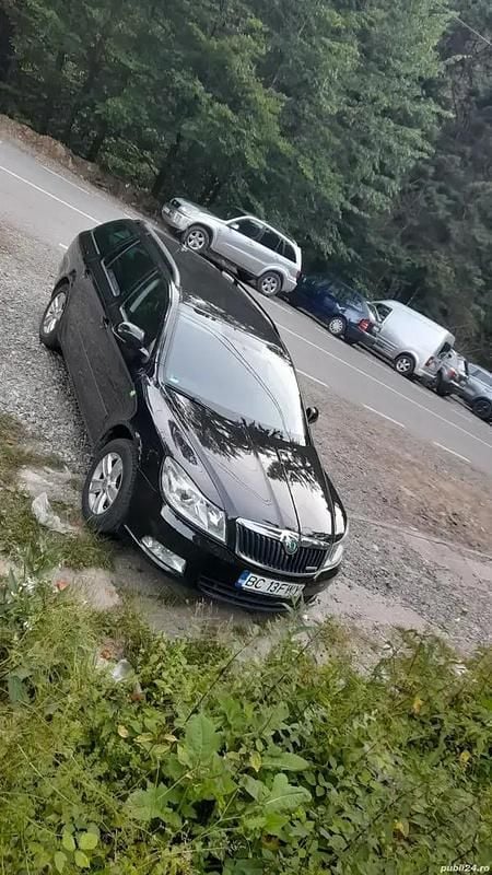 Negru Utilizat 2012 Skoda Octavia Break | 4.548 EUR (Preț OK) - Imagine 1/4