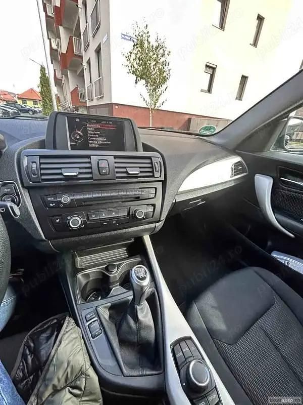 Second-hand BMW 114 102 CP (75 kW) 2014 Negru Hatchback