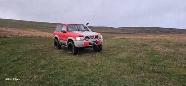 Rosu Utilizat 2000 Nissan Patrol SUV | 8.950 EUR - Imagine 1/4