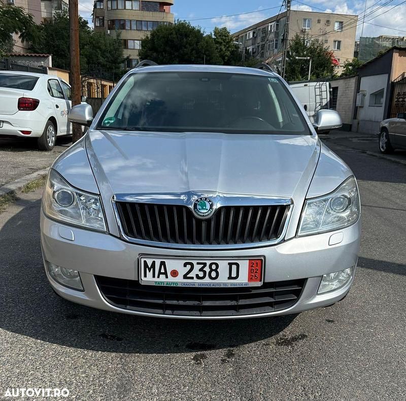 Culoareargint Utilizat 2012 Skoda Octavia Ambition Break | 5.500 EUR (Preț OK) - Imagine 1/4