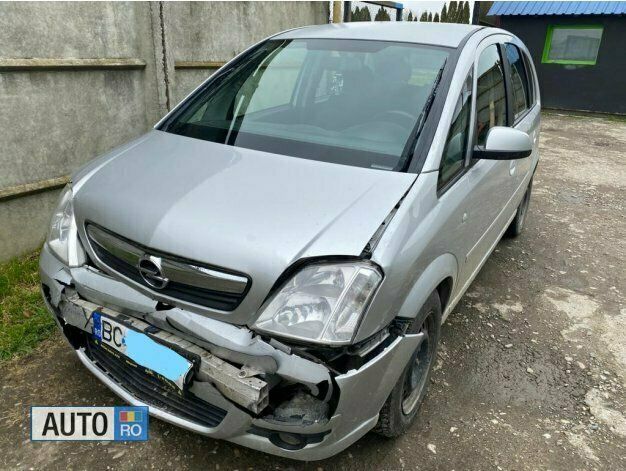 Second-hand Opel Meriva 66 CP (48 kW) 2010 Argintiu Monovolum