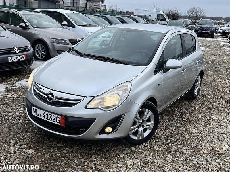 Second-hand Opel Corsa Edition 100 CP (73 kW) 2011 Culoareargint Hatchback