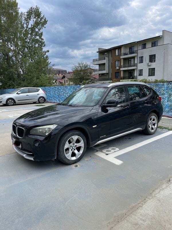 Negru Utilizat 2011 BMW X1 SUV | 7.400 EUR (Super Preț) - Imagine 1/4