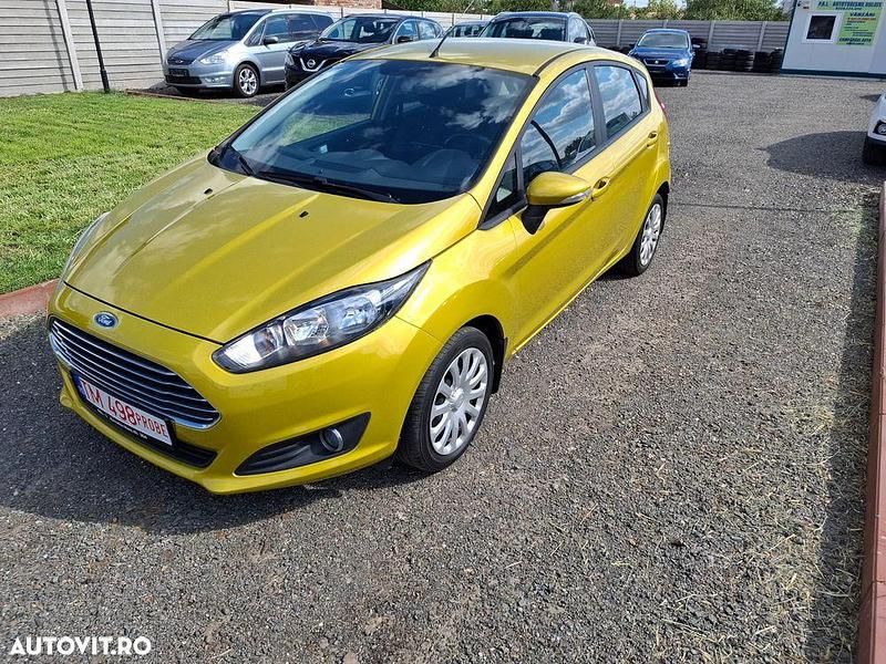 Auriu Utilizat 2014 Ford Fiesta Titanium Hatchback | 4.500 EUR (Super Preț) - Imagine 1/4
