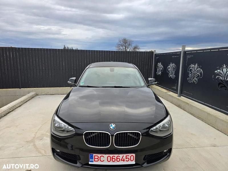 Culoarenegru Utilizat 2011 BMW 118 Lifestyle Hatchback | 5.650 EUR (Preț OK) - Imagine 1/4