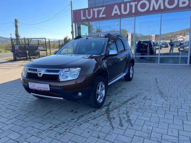 Maro metalizat Utilizat 2012 Dacia Duster Lauréate SUV | 7.499 EUR (Puțin scump) - Imagine 1/4