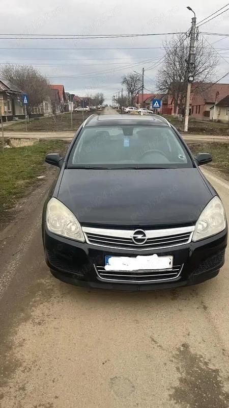 Second-hand Opel Astra 101 CP (74 kW) 2010 Negru Break