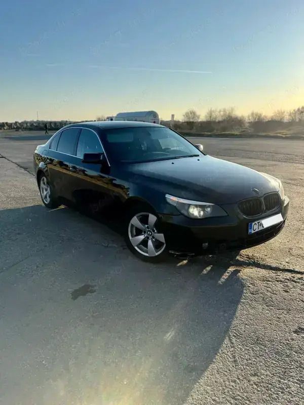 Second-hand BMW 520 163 CP (119 kW) 2006 Negru Berlinǎ