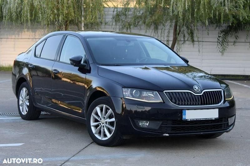 Culoarenegru Utilizat 2016 Skoda Octavia Elegance Berlinǎ | 9.490 EUR (Super Preț) - Imagine 1/4