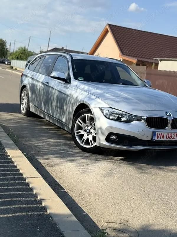 Argintiu Utilizat 2017 BMW 318 Break | 12.000 EUR (Preț bun) - Imagine 1/4