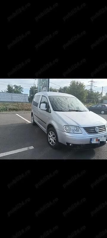 Second-hand VW Caddy 105 CP (77 kW) 2009 Argintiu Monovolum