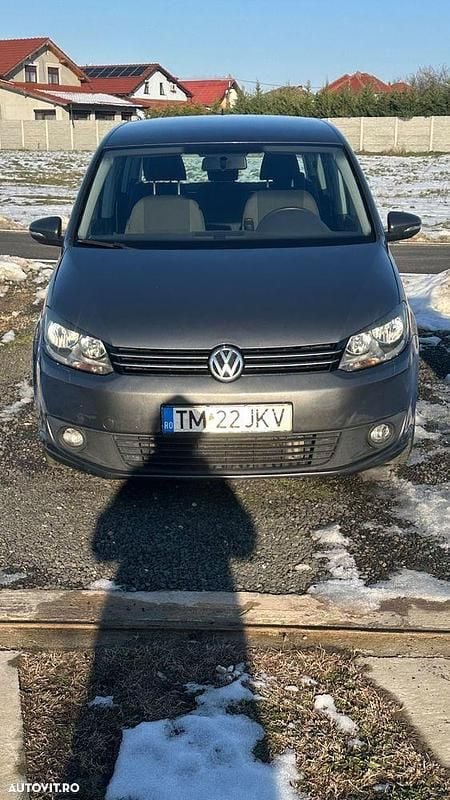 Second-hand VW Touran Trendline 105 CP (77 kW) 2012 Culoareargint Monovolum