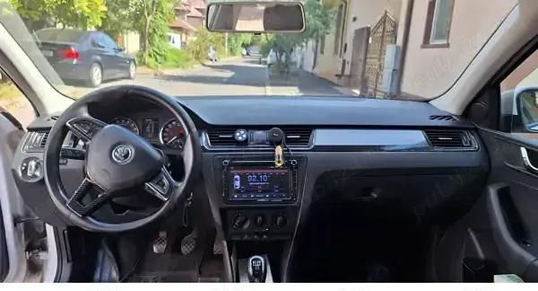 Second-hand Skoda Rapid Active 105 CP (77 kW) 2014 Alb Berlinǎ