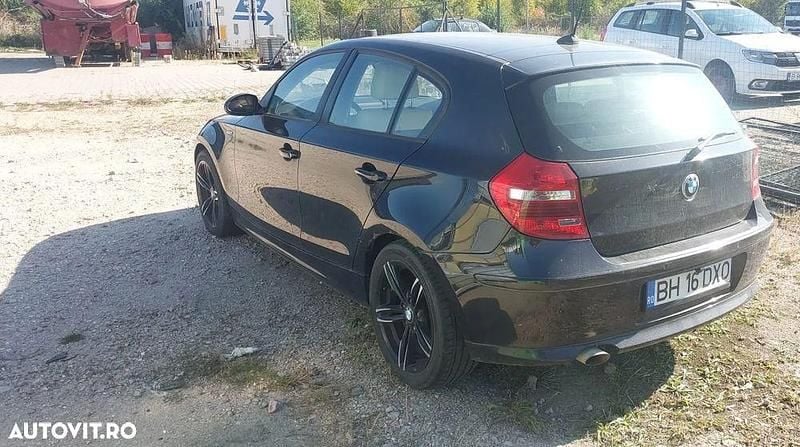 Culoarenegru Utilizat 2008 BMW 118 Sport Line Hatchback | 3.500 EUR (Preț bun) - Imagine 1/4