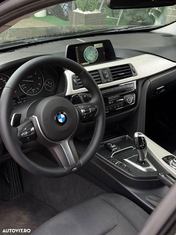 Culoarenegru Utilizat 2015 BMW 318 Break | 10.900 EUR (Preț OK) - Imagine 1/4