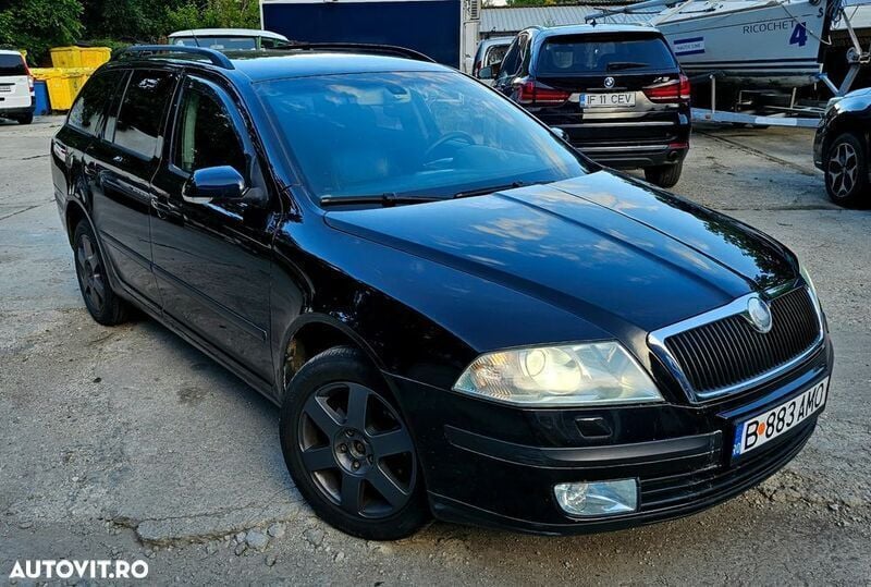 Negru Utilizat 2006 Skoda Octavia Elegance Break | 2.900 EUR (Preț bun) - Imagine 1/4