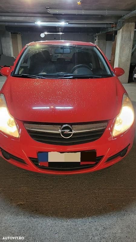 Rosu Utilizat 2011 Opel Corsa Essentia | 2.300 EUR (Preț bun) - Imagine 1/4