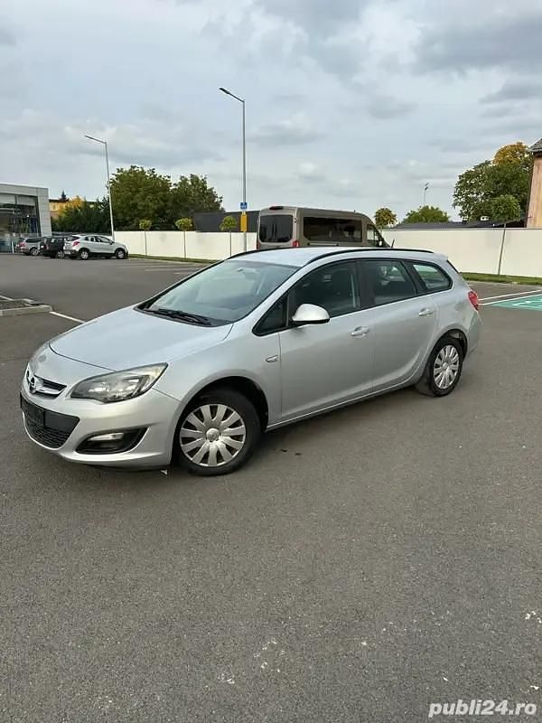 Argintiu Utilizat 2013 Opel Astra Break | 2.890 EUR (Super Preț) - Imagine 1/4