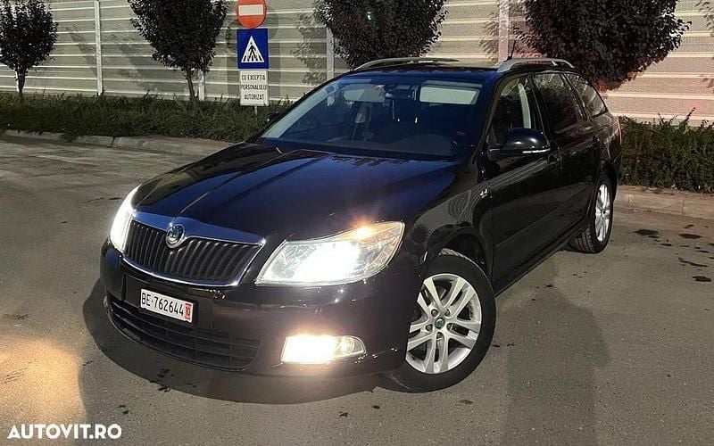 Culoarenegru Utilizat 2013 Skoda Octavia Break | 4.890 EUR (Preț bun) - Imagine 1/4