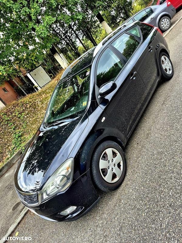 Culoarenegru Utilizat 2012 Kia Ceed DREAM-TEAM Edition Break | 3.390 EUR (Preț OK) - Imagine 1/4
