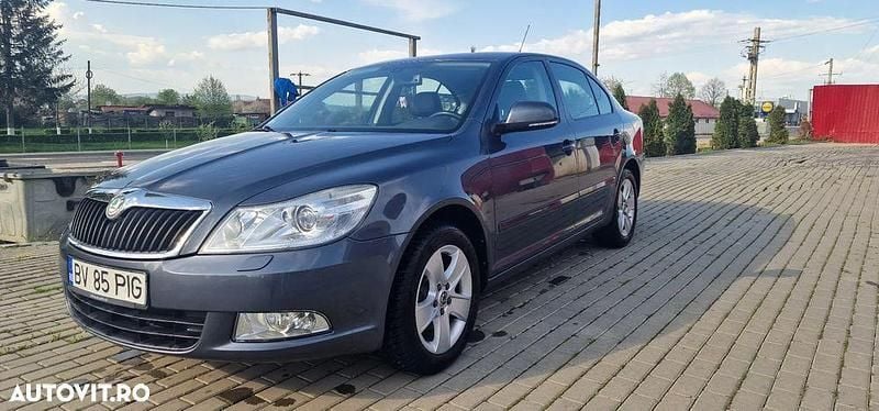 Gri Utilizat 2010 Skoda Octavia Ambiente Berlinǎ | 4.700 EUR (Preț OK) - Imagine 1/4