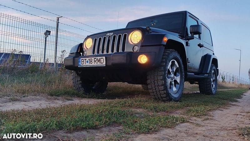 Culoarenegru Utilizat 2017 Jeep Wrangler Sahara SUV | 25.700 EUR (Preț OK) - Imagine 1/4