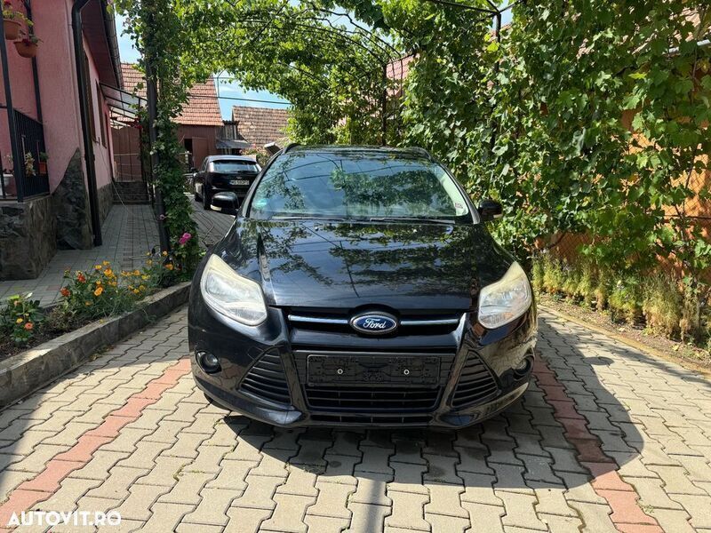 Negru Utilizat 2011 Ford Focus Titanium Break | 3.650 EUR (Preț bun) - Imagine 1/4