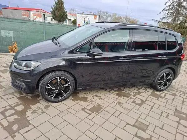 Second-hand VW Touran 115 CP (84 kW) 2017 Negru Monovolum