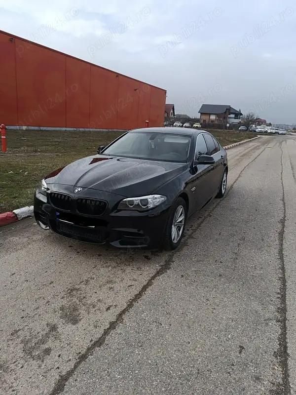 Second-hand BMW 520 190 CP (139 kW) 2014 Negru Berlinǎ