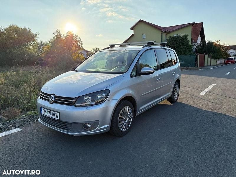 Second-hand VW Touran 140 CP (102 kW) 2011 Culoareargint Monovolum