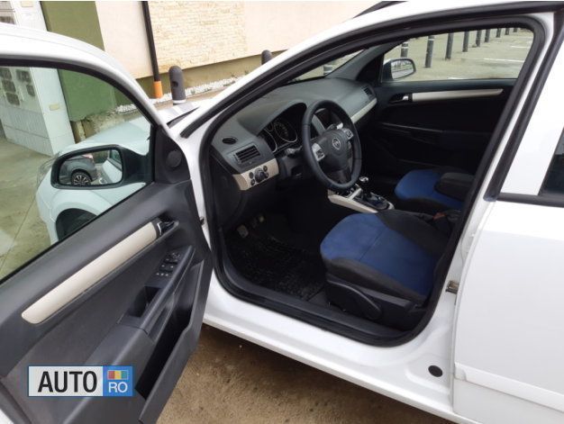 Second-hand Opel Astra 110 CP (80 kW) 2009 Alb Break