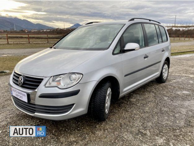 Second-hand VW Touran 105 CP (77 kW) 2007 Argintiu Monovolum