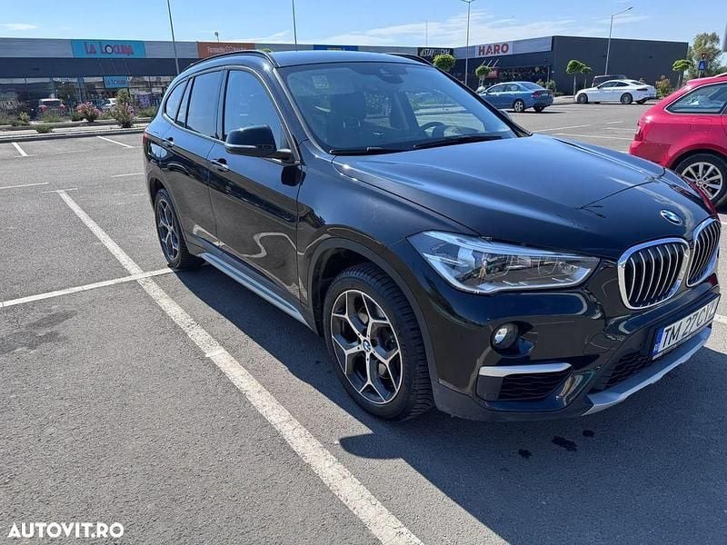 Culoarenegru Utilizat 2017 BMW X1 Advantage SUV | 16.900 EUR (Super Preț) - Imagine 1/4