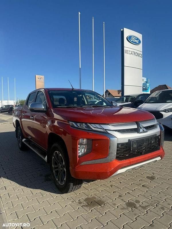 Culoareportocaliu Utilizat 2020 Mitsubishi L200 Instyle Pickup | 21.780 EUR (Preț OK) - Imagine 1/4