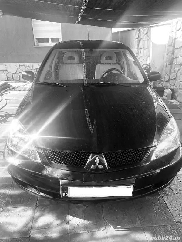 Second-hand Mitsubishi Lancer 102 CP (75 kW) 2008 Negru Berlinǎ