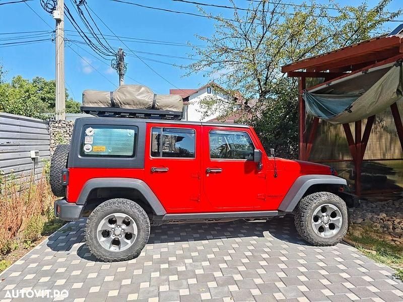 Culoarerosu Utilizat 2016 Jeep Wrangler Unlimited Rubicon SUV | 33.000 EUR (Super Preț) - Imagine 1/4
