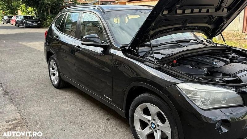 Culoarenegru Utilizat 2013 BMW X1 SUV | 8.800 EUR (Preț OK) - Imagine 1/4