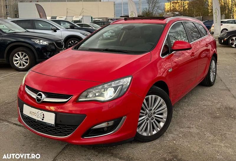 Culoarerosu Utilizat 2016 Opel Astra Exklusiv Break | 6.390 EUR (Preț OK) - Imagine 1/4