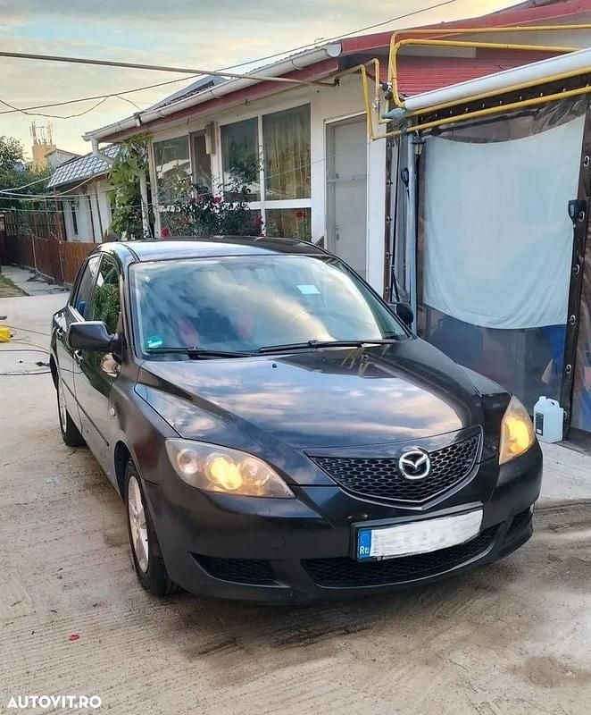 Culoarenegru Utilizat 2006 Mazda 3 Hatchback | 2.799 EUR (Puțin scump) - Imagine 1/4