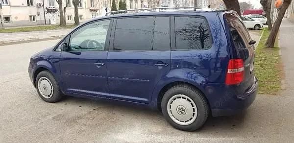 Second-hand VW Touran 105 CP (77 kW) 2005 Albastru Monovolum