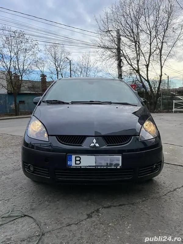 Negru Utilizat 2008 Mitsubishi Colt Berlinǎ | 1.799 EUR (Preț OK) - Imagine 1/4