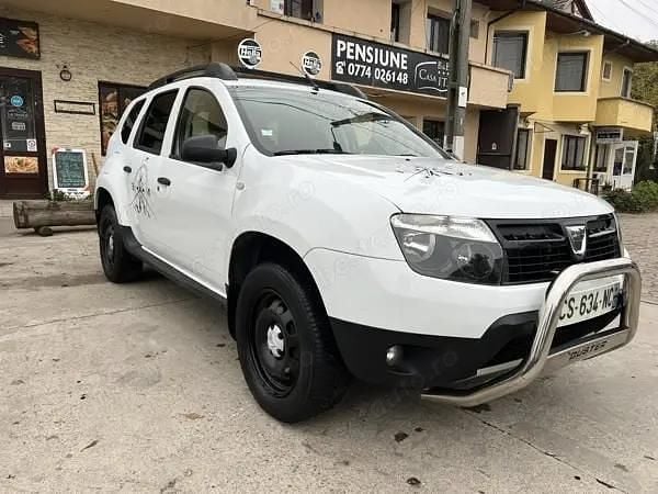 Alb Utilizat 2013 Dacia Duster SUV | 6.650 EUR (Preț OK) - Imagine 1/4