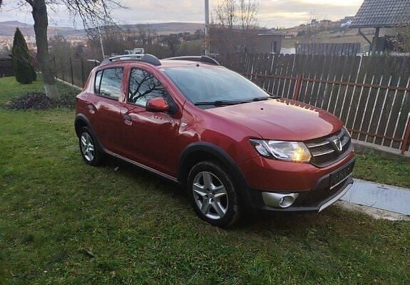 Second-hand Dacia Sandero Stepway 90 CP (66 kW) 2015 Roşu Berlinǎ
