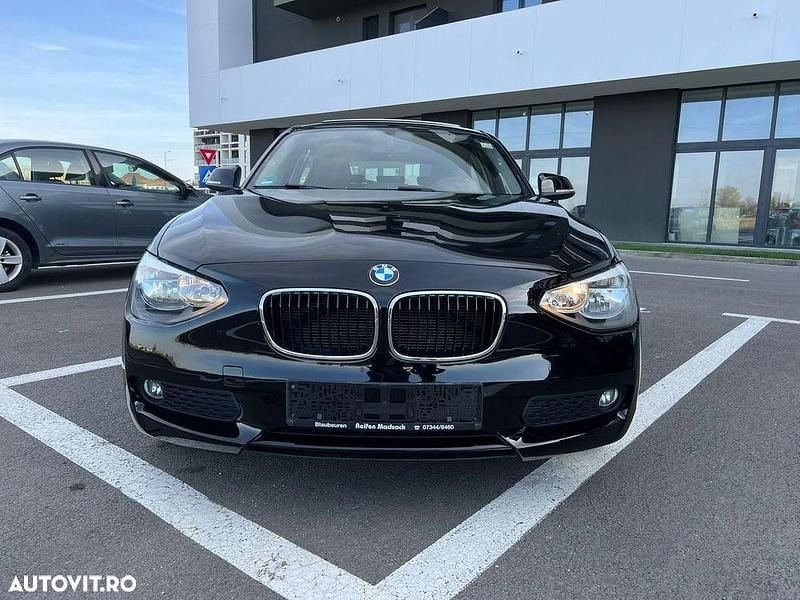Culoarenegru Utilizat 2012 BMW 116 Hatchback | 4.990 EUR (Super Preț) - Imagine 1/4