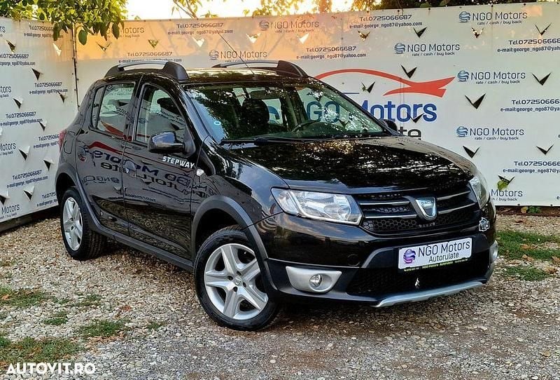 Culoarenegru Utilizat 2014 Dacia Sandero Prestige Hatchback | 4.990 EUR (Preț OK) - Imagine 1/4