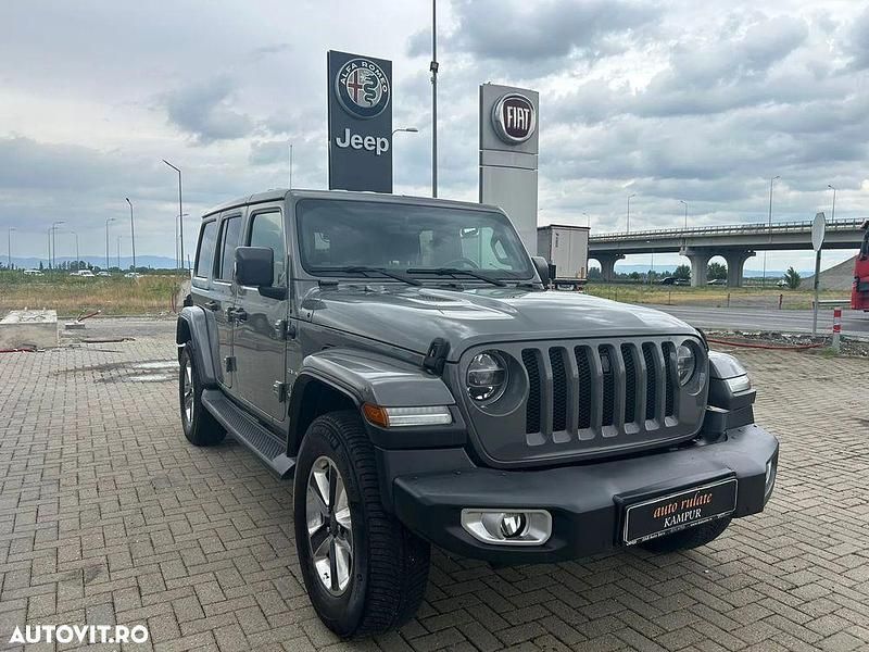 Gri Utilizat 2019 Jeep Wrangler Unlimited Sahara SUV | 35.500 EUR - Imagine 1/4