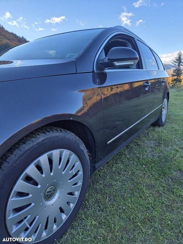 Second-hand VW Passat Comfortline 110 CP (80 kW) 2009 Culoaremaro Break
