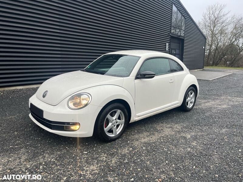 Alb Utilizat 2011 VW Beetle Exclusive Coupe | 6.900 EUR (Preț bun) - Imagine 1/4